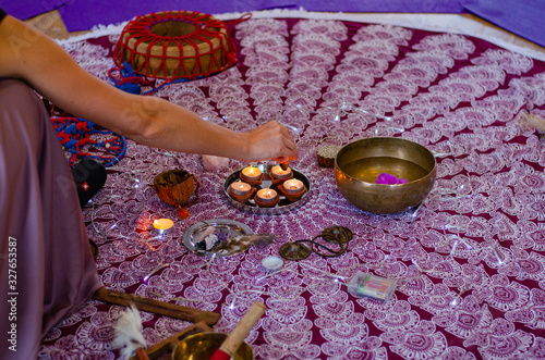hands with easter eggs and flowers