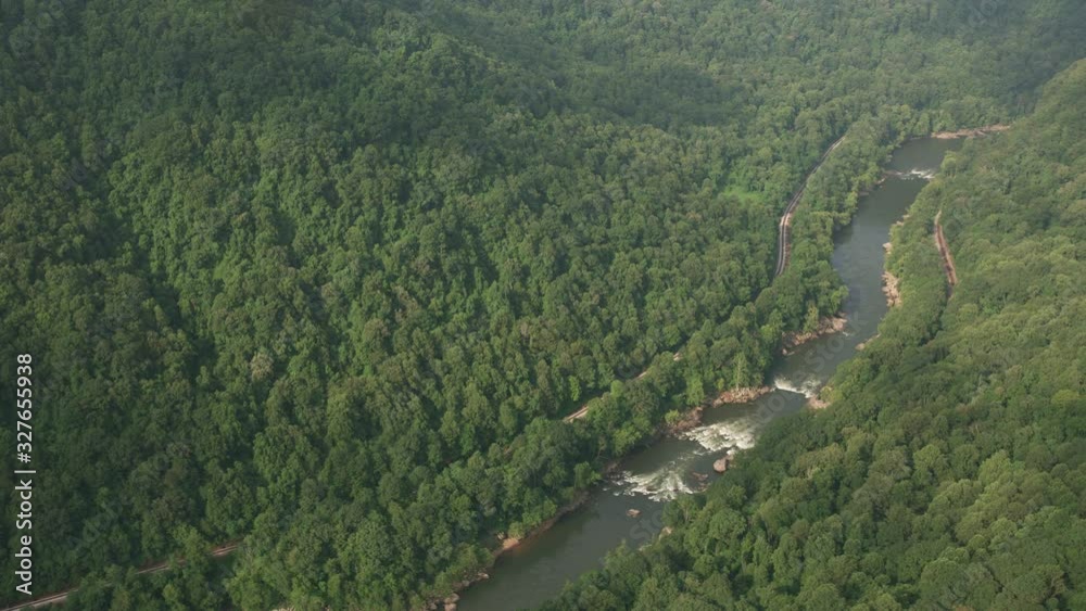 Aerial view of the New River Gorge National River. Shot from helicopter with Cineflex gimbal and RED 8K camera. Aerial view of the New River Gorge National River. Shot from helicopter with Cineflex gimbal and RED 8K camera.