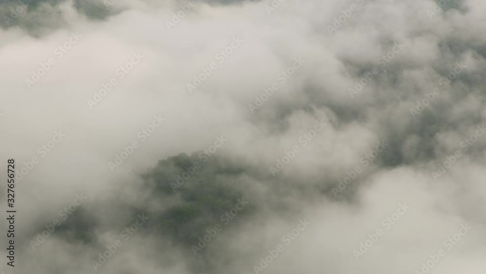 Aerial view of clouds and forest, Blue Ridge Mountains in Virginia. Shot from helicopter with Cineflex gimbal and RED 8K camera. Aerial view of clouds and forest, Blue Ridge Mountains in Virginia. Shot from helicopter with Cineflex gimbal and RED 8K camera.
