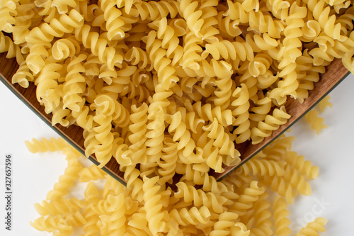 Italian spiral macaroni macaroni raw food , background.