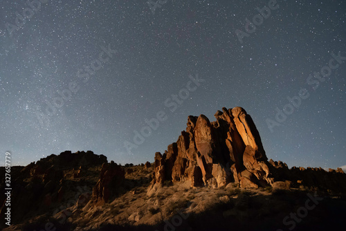 USA, Nevada, Lincoln County, Basin and Range National Monument. Moonlit rocks under the stars in the Canyon of Faces, part of White River Narrows Archaeological District