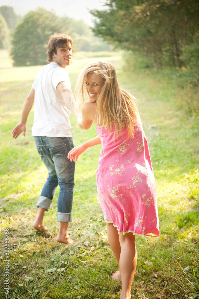 Happy young couple in love enjoying a summer day Happy young couple in love enjoying a summer day