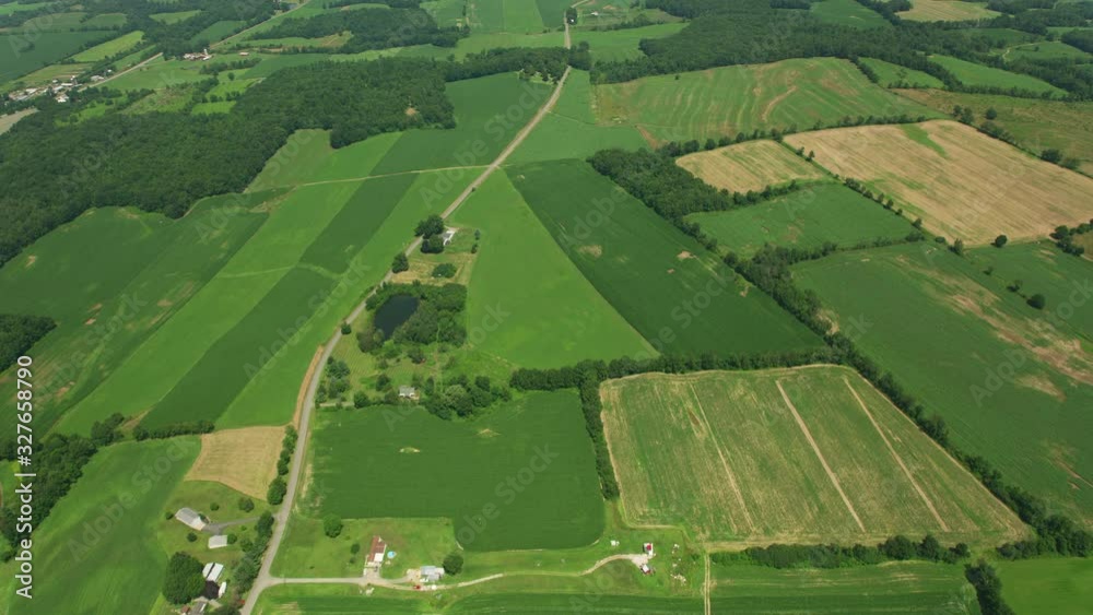 Indiana circa-2019.  Aerial view of rural Indiana farmlands.  Shot from helicopter with Cineflex gimbal and RED 8K camera.