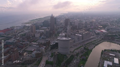 Wallpaper Mural Cleveland, Ohio circa-2019.  Aerial view of Cleveland at sunrise.  Shot from helicopter with Cineflex gimbal and RED 8K camera. Torontodigital.ca