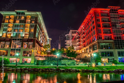 Greenville buildings on the river at night photo