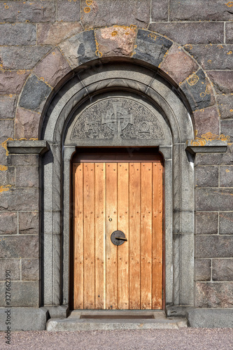 Wooden door of Gudhjem church, Bornholm island, Denmark.