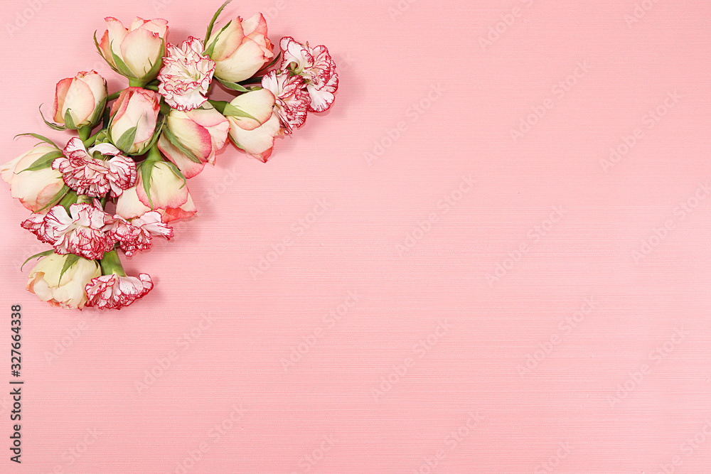 Arrangement of flowers on a pink isolated background, place for text, flat lay. Creative modern bouquet, minimal holiday and spring concept. Greeting card for Women's Day ,happy birthday, wedding, Arrangement of flowers on a pink isolated background, place for text, flat lay. Creative modern bouquet, minimal holiday and spring concept. Greeting card for Women's Day ,happy birthday, wedding,