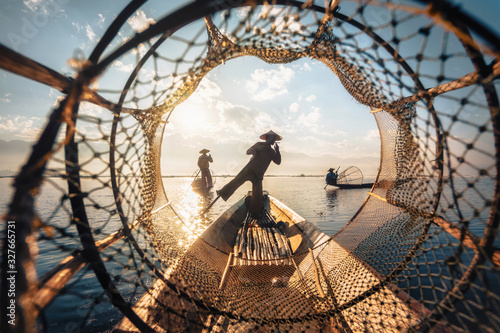 Fototapeta Inle Lake Intha Fishermen at Sunrise in Shan State, Myanmar (Burma)