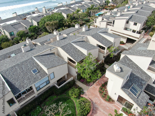 Aerial view of wealthy condy community on the cleef next to the ocean in south california, USA photo