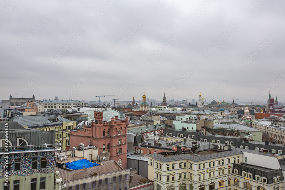 City landscape in cloudy weather from the observation deck of the Children's World Mall. Moscow, Russia