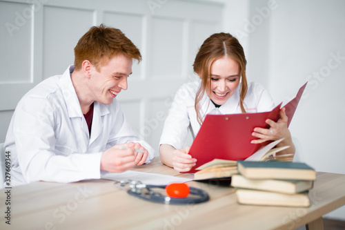 Interns have a rest in the internship during a short break and rejoice