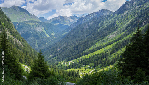 Obraz na płótnie A beautful green valley in the alps of Vorarlberg, austria. w salonie