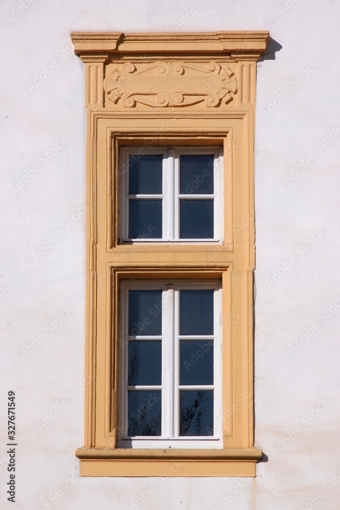 Renaissance window frame at the Amtshaus building facade in the old town of Trier Pfalzel in Germany