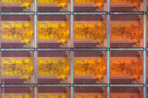 Macro photo of a silicon wafer intergrated circuit (IC)