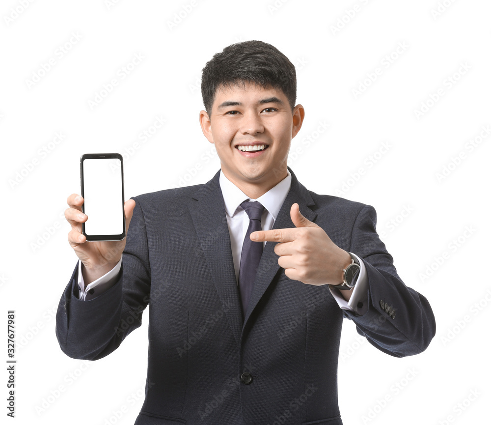 Young Asian businessman with mobile phone on white background Young Asian businessman with mobile phone on white background