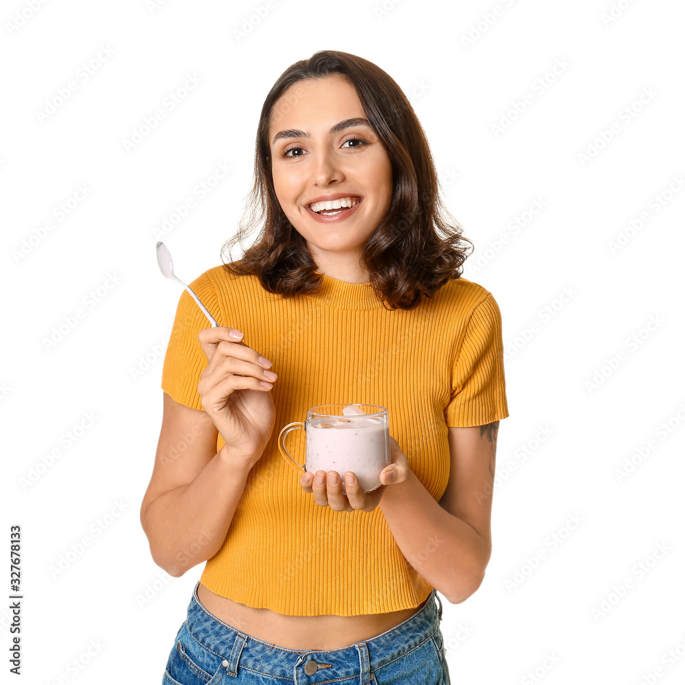 Young woman with tasty yogurt on white background Young woman with tasty yogurt on white background