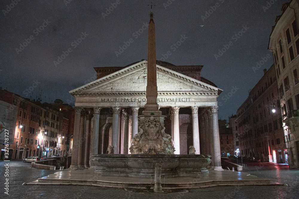 The Pantheon of Rome at night with a cloudy sky, Italy	
