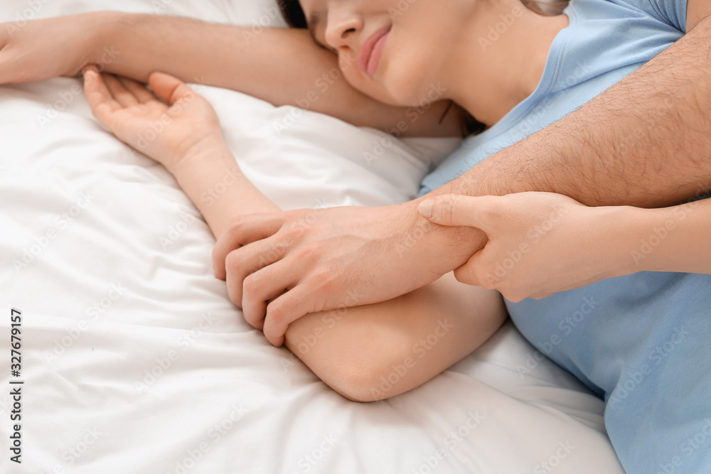 Young couple sleeping in bed Young couple sleeping in bed