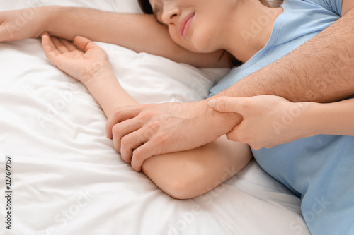 Young couple sleeping in bed
