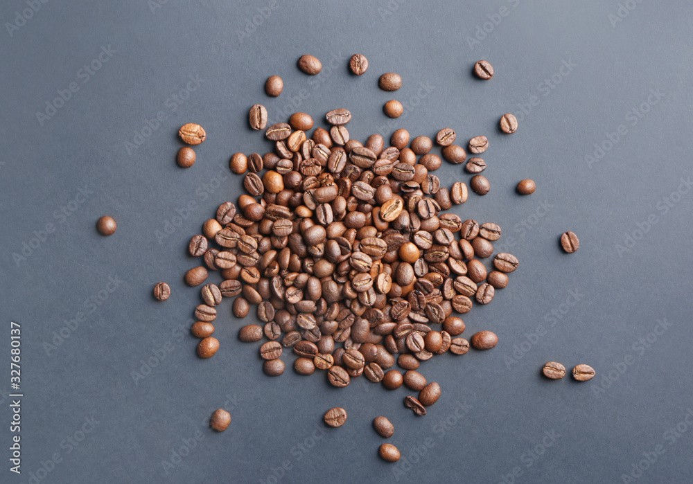 Many coffee beans on dark background Many coffee beans on dark background