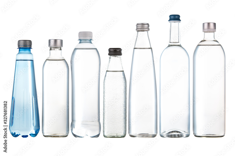 Glass and plastic bottles of fresh drinking water Glass and plastic bottles of fresh drinking water