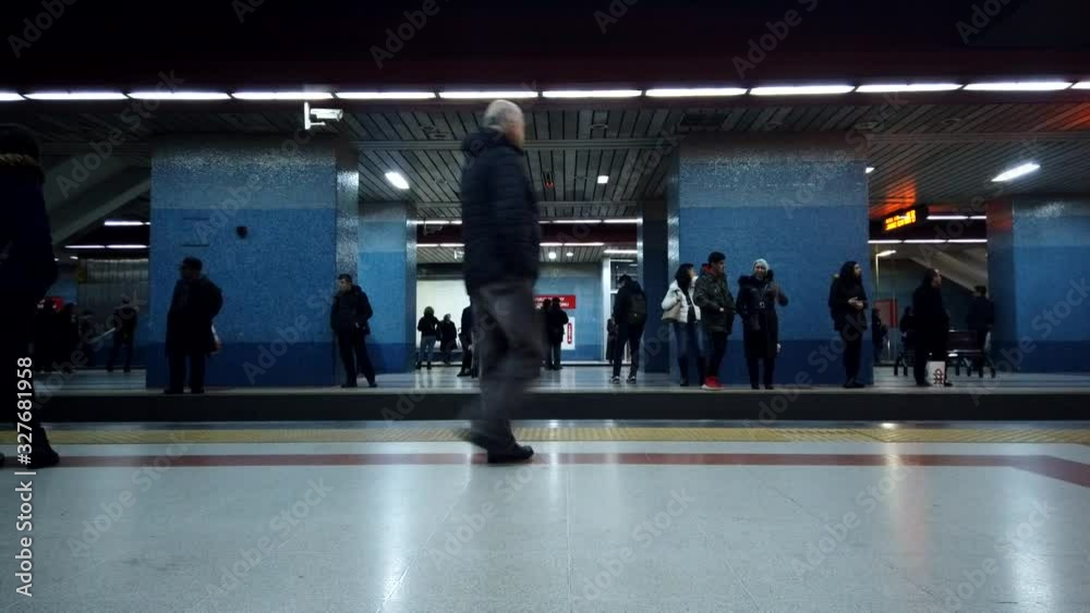 Ankara, Turkey - February 26, 2020: Time-lapse of people waiting and boarding trains at subway station platform in Ankara, Turkey. Turkey city life, or public transportation concept 