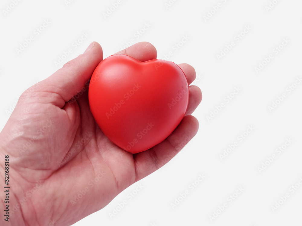 Red heart in a hand, Concept love and medical care. Red heart in a hand, Concept love and medical care.
