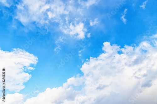 Sky background. Blue sky with fluffy white clouds