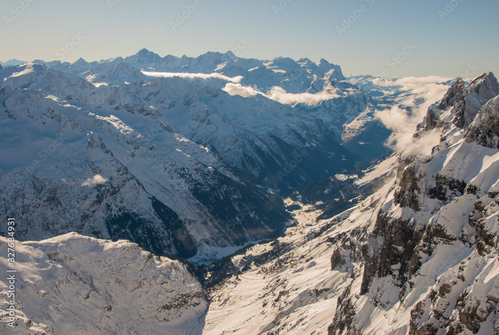 Beautiful panoramic view of snow-capped mountains in the Swiss Alps. Beautiful panoramic view of snow-capped mountains in the Swiss Alps.