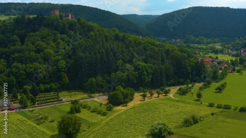 Aerial view of the  village and castle Gamburg in Germany. Zoom out from the hill. photo