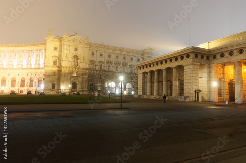 Gate at Hofburg Palace in Vienna mist evening