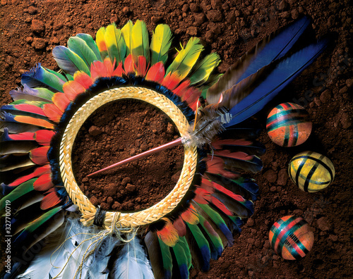 Brazilian Indian headdress, beautiful, colorful, over earth