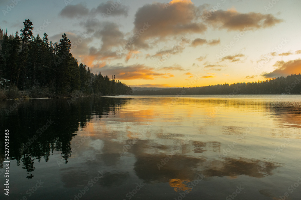 Fototapeta premium colorful sunrise on a calm lake