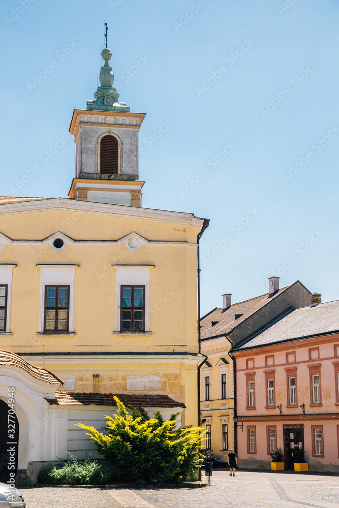 Castle district old church tower and colorful buildings in Veszprem, Hungary