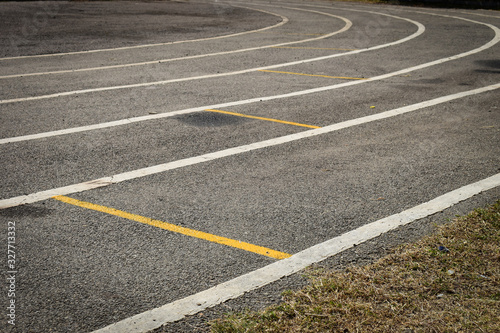 black tarmac asphalt of running track  athletic sport background