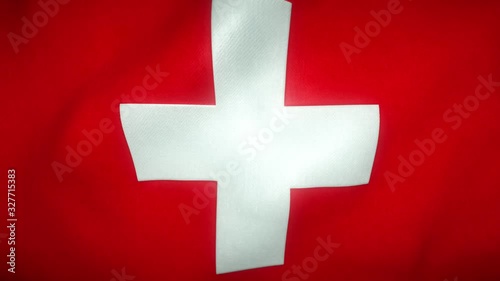 flag of switzerland waving in the wind photo