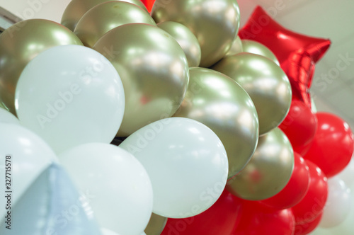 decoration with red, silver and white balloons. fancy balloons. A bunch of  balloons. celebration, opening ceremony photo