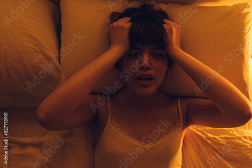 imsomnia concept young woman can not sleep at night