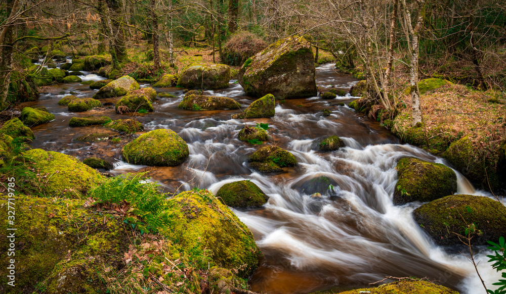 Raging torrent waterfalls in Dartmoor, Devon