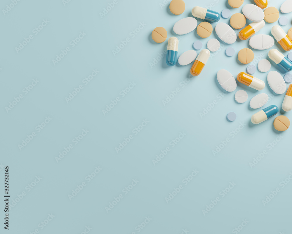 Container, scattered pills and stethoscope stock photo