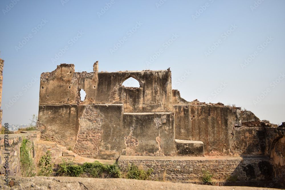 Old Historical Golconda Fort Ruined Walls in India Background stock photograph