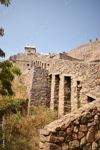 Old Historical Golconda Fort Ruined Walls in India Background stock photograph