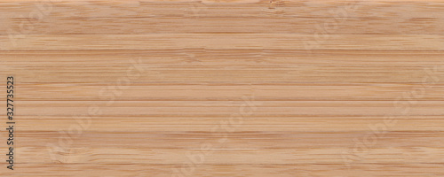 Seamless light wood background. Wooden laminate surface. Long wide panoramic banner of seamless wood.