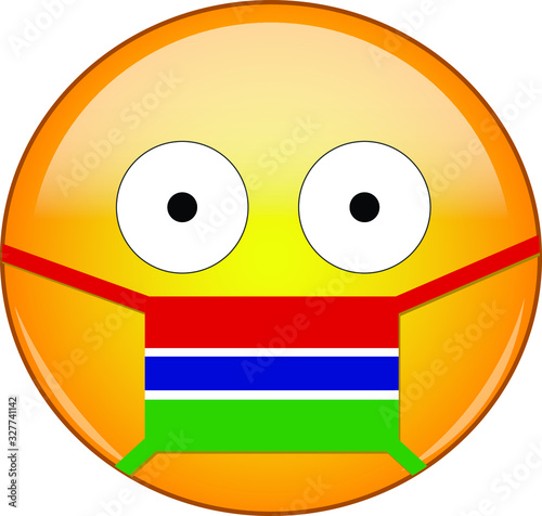 Yellow scared emoji in Gambian medical mask protecting from SARS, coronavirus, bird flu and other viruses, germs and bacteria and contagious disease as well as toxic smog in Gambia.