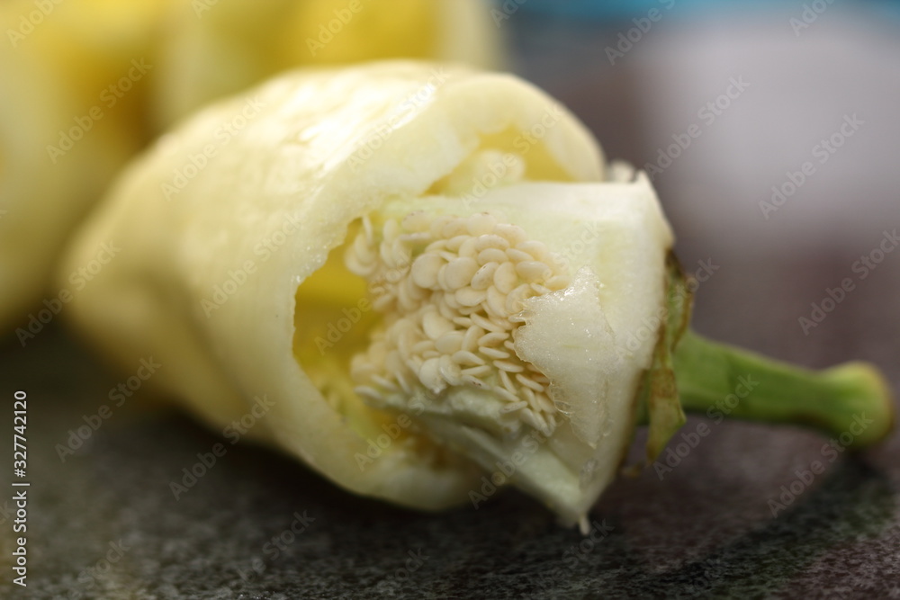 Remove seeds from peppers. Making Stuffed Peppers Series. Remove seeds from peppers. Making Stuffed Peppers Series.
