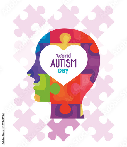 world autism day with head silhouette and puzzle pieces vector illustration design