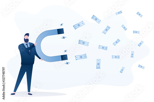 Handsome businessman with a huge magnet attracting money. Banknotes fly to the employee.