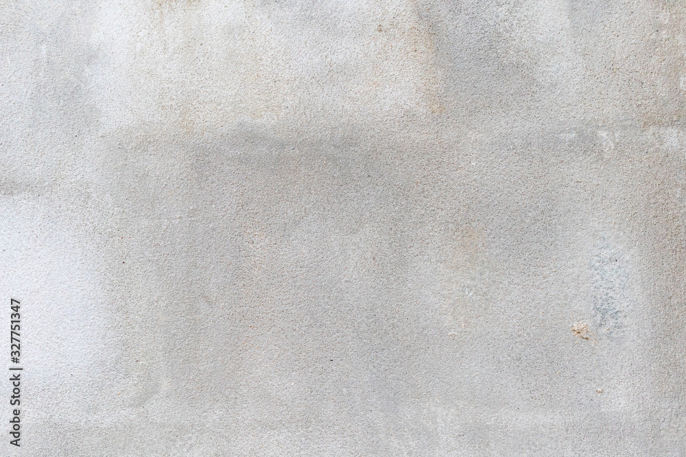 Fototapeta premium cracked concrete wall with gray cement surface