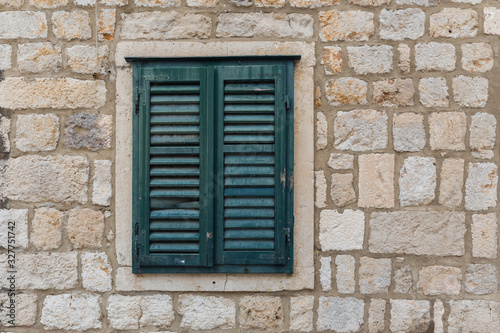 Brick walls background of ancient buildings with windows