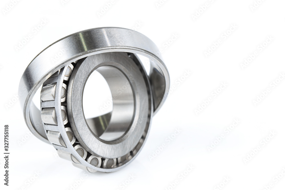 tapered roller bearing spare part of mechanical on the white background.. tapered roller bearing spare part of mechanical on the white background..